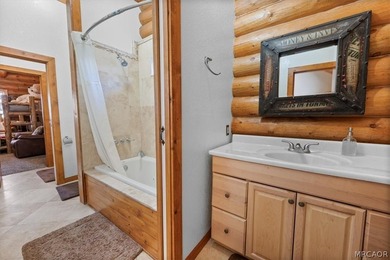 Discover the exceptional craftsmanship of this stunning log home - photo 29