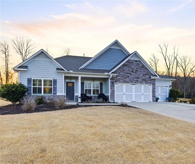 This refined ranch-style residence in Calhoun offers an