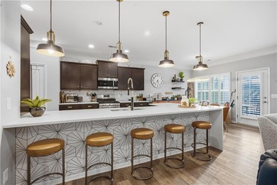 This refined ranch-style residence in Calhoun offers an