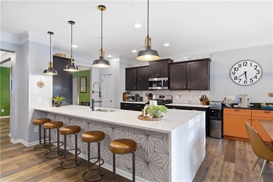 This refined ranch-style residence in Calhoun offers an