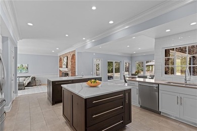 This beautiful brick traditional, majestically set back on the