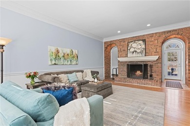 This beautiful brick traditional, majestically set back on the