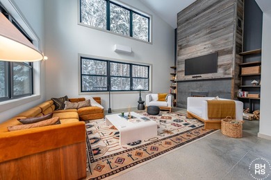 Tucked away in a beautiful private wooded setting, this - photo 4