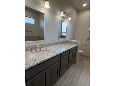 *Ruby Model* with no steps access is situated across from the