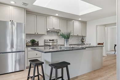 Expertly renovated from top to bottom, this exceptional home - photo 18