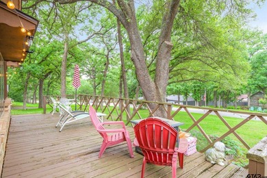 Tucked inside the gated golf and lake community of Hideaway and - photo 3