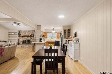Tucked inside the gated golf and lake community of Hideaway and - photo 7