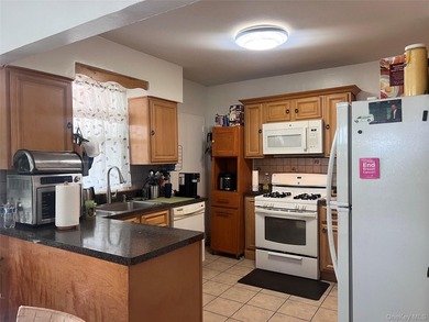 This versatile two-family Cape offers the best of both worlds - photo 5
