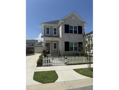 Construction complete and move-in ready! This home is less than - photo 1