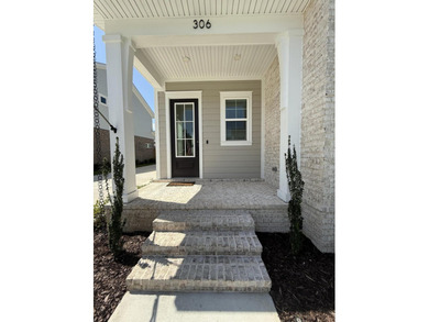 Construction complete and move-in ready! This home is less than - photo 3