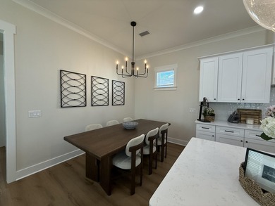 Construction complete and move-in ready! This home is less than - photo 9