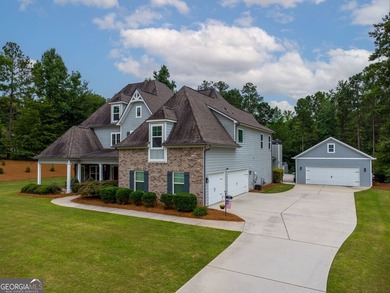 Welcome to 122 Brooks Landing, an exceptional 5-bedroom, 5 - photo 3