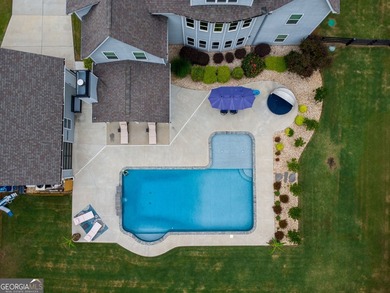 Welcome to 122 Brooks Landing, an exceptional 5-bedroom, 5 - photo 5