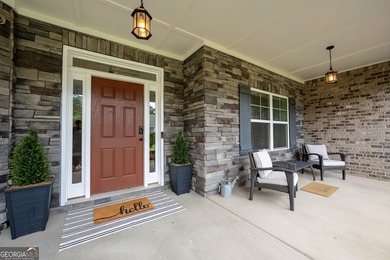 Welcome to 122 Brooks Landing, an exceptional 5-bedroom, 5 - photo 7