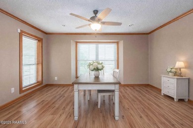 Acadian Style solid metal frame home with metal roof situated on