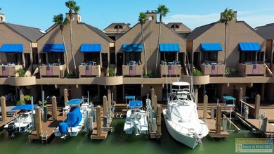 A fabulous waterfront condominium completely remodeled by - photo 1