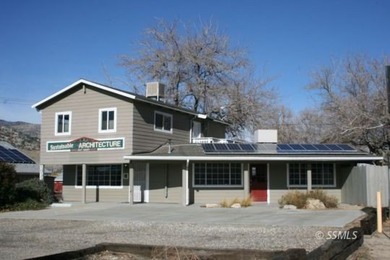 This C-2 zoned commercial property offers a rare live/work setup - photo 2