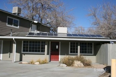 This C-2 zoned commercial property offers a rare live/work setup - photo 3