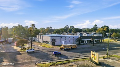 Seize a rare opportunity to own a 22,000 SF retail landmark