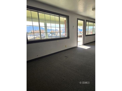 This C-2 zoned commercial property offers a rare live/work setup - photo 10