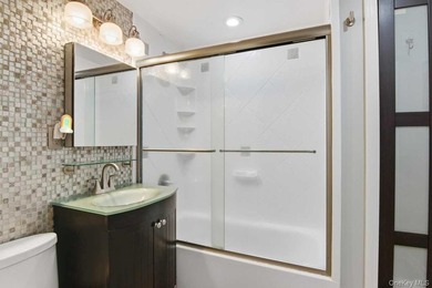 Welcome to this spacious, move-in-ready two-bedroom co-op - photo 13