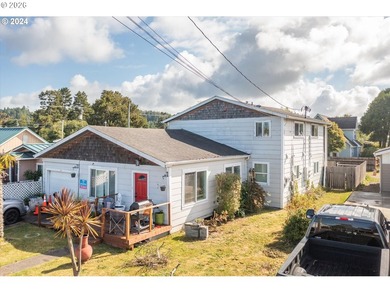Coastal charm meets fun, lofty vibes in this multi-family home - photo 1