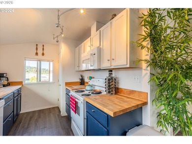 Coastal charm meets fun, lofty vibes in this multi-family home - photo 6