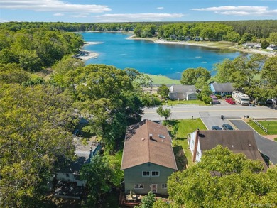 Nestled in the sought-after Lake Panamoka community, this - photo 1