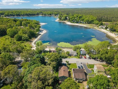 Nestled in the sought-after Lake Panamoka community, this - photo 3