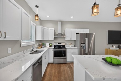 Built in 2021, this quality stick built home offers the ease of - photo 6