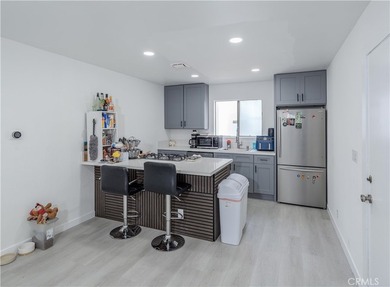 Welcome to this beautifully renovated first-level condominium in - photo 1