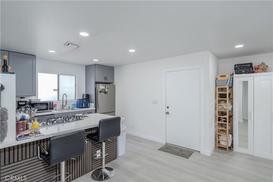 Welcome to this beautifully renovated first-level condominium in - photo 7