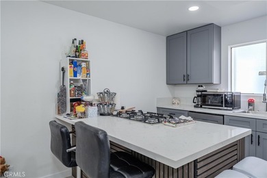 Welcome to this beautifully renovated first-level condominium in - photo 8
