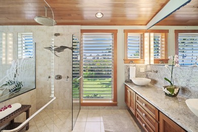 Nestled along the lush Haena coastline of Kauai, this gated - photo 13