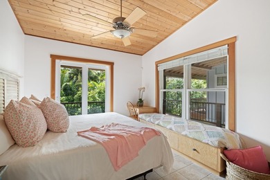 Nestled along the lush Haena coastline of Kauai, this gated - photo 18