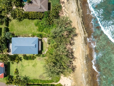 Nestled along the lush Haena coastline of Kauai, this gated - photo 26