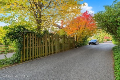 Step into timeless elegance with this rare two-building property - photo 4