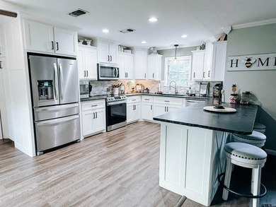 Welcome home to this charming 3-bedroom, 2-bath brick home - photo 5