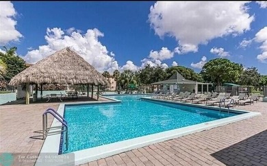 Updated top floor condo with brand newer AC, water heater, new - photo 1