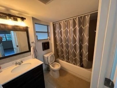 Updated top floor condo with brand newer AC, water heater, new - photo 7