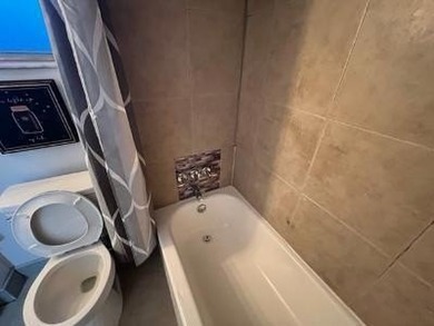 Updated top floor condo with brand newer AC, water heater, new - photo 8