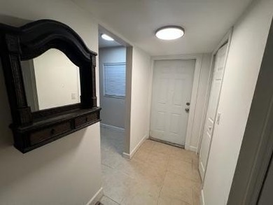 Updated top floor condo with brand newer AC, water heater, new - photo 10