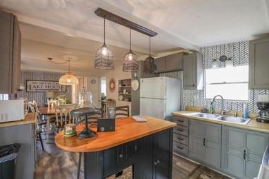 Check out this Lake Sinclair home overlooking peaceful water - photo 11