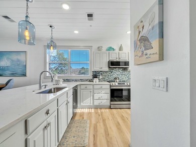 This TOTALLY renovated unit is a must see for anyone looking for - photo 12