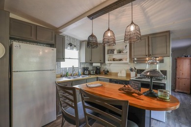Check out this Lake Sinclair home overlooking peaceful water - photo 12