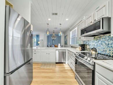 This TOTALLY renovated unit is a must see for anyone looking for - photo 14