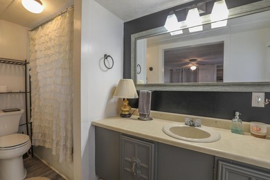 Check out this Lake Sinclair home overlooking peaceful water - photo 19