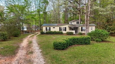 Check out this Lake Sinclair home overlooking peaceful water - photo 32
