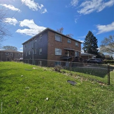Solid 6-unit multifamily investment opportunity in Ecorse. The - photo 2