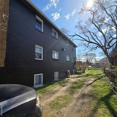 Solid 6-unit multifamily investment opportunity in Ecorse. The - photo 3
